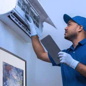 Technician installing mini-split